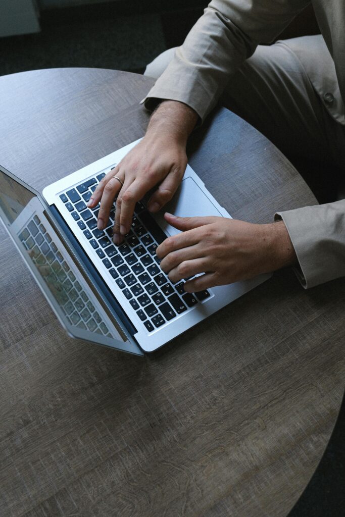Financial advisor working on laptop for client consultation and planning